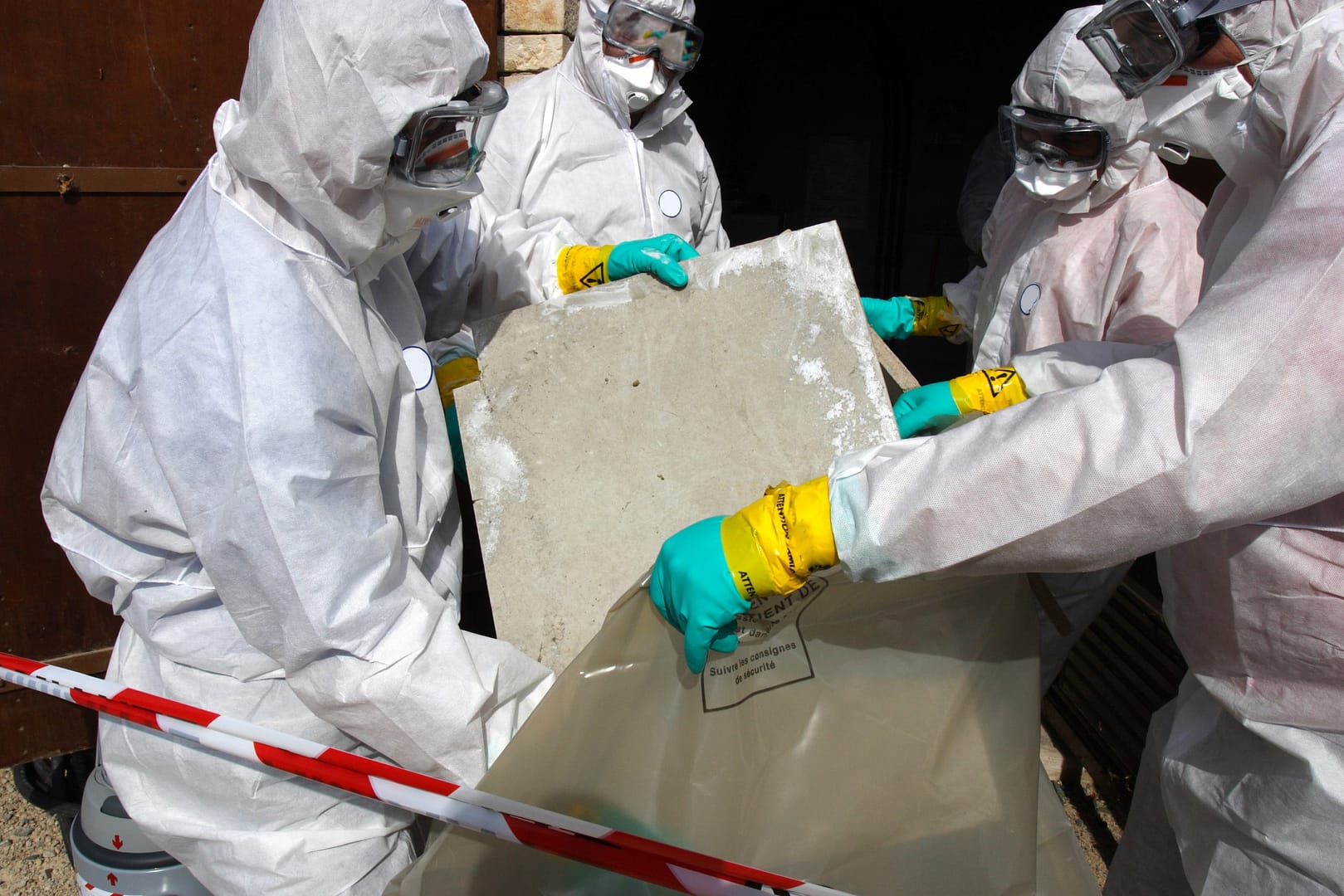 Removing materials containing some asbestos asbestos on the ceiling
